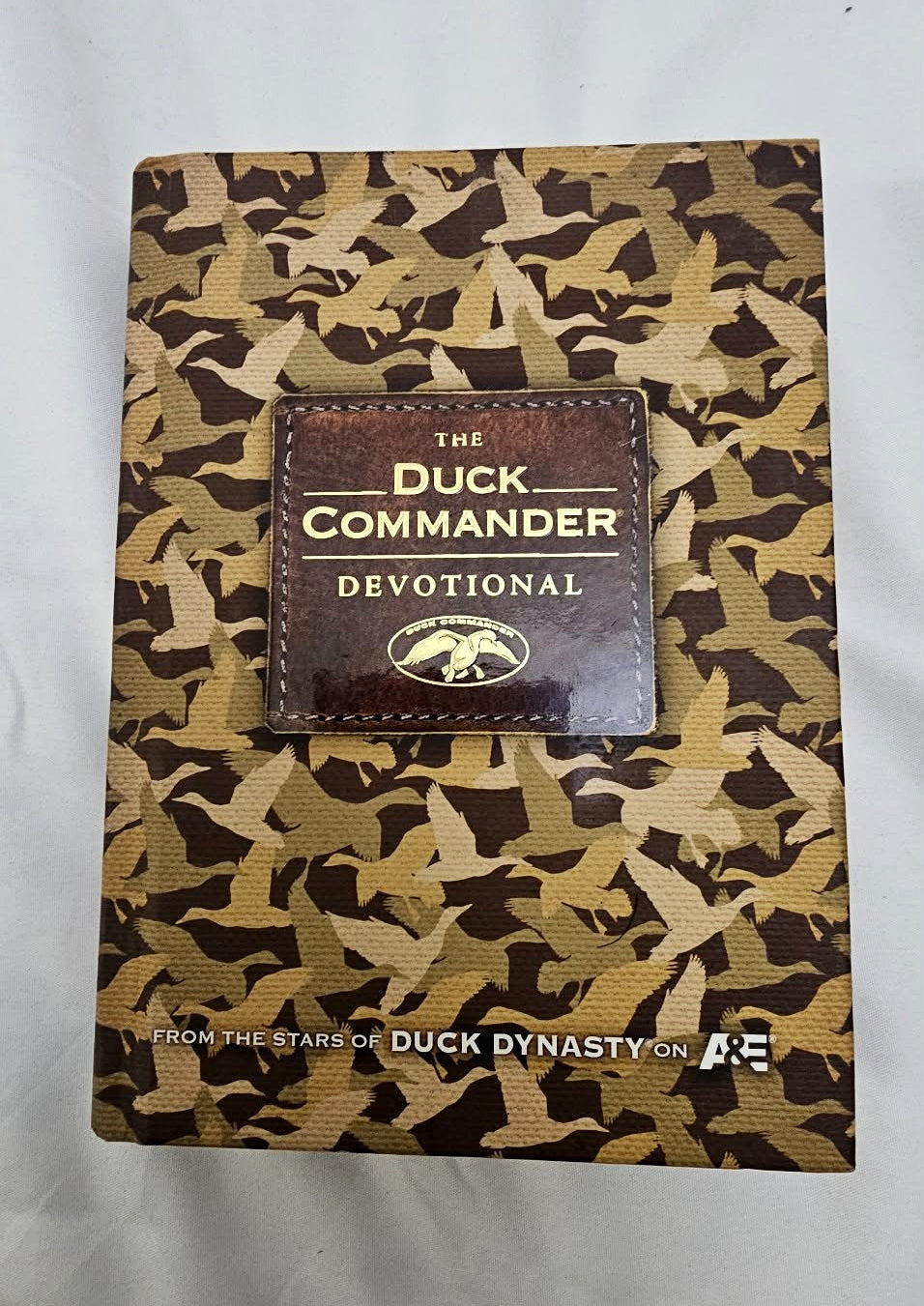 Front cover of The Duck Commander Devotional hardcover by Al Robertson.