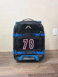 Front view of the black and blue American Kargo roller gear bag with custom 78 patch.