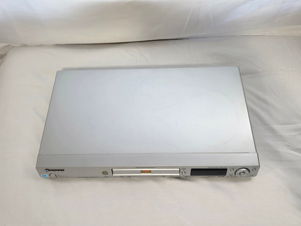 Top view of the slim silver Pioneer DV-270 DVD player.