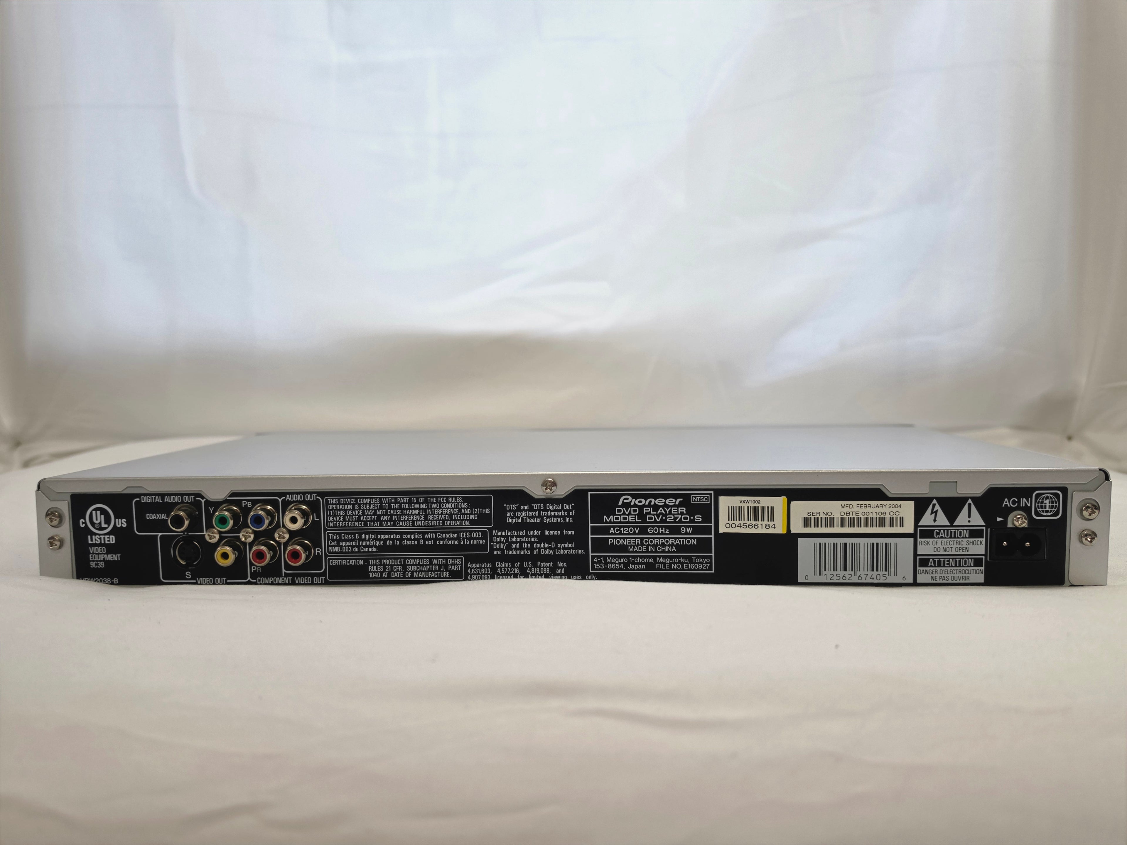 Rear panel of the Pioneer DV-270 showing composite AV outputs, power cord, and labels.