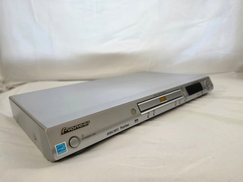 Front-left angled view of the silver Pioneer DV-270 DVD player.