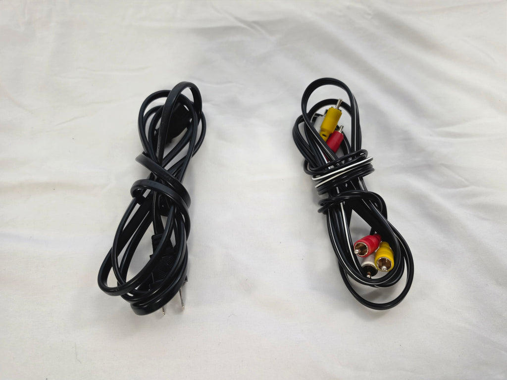Included black power cord and red, white, and yellow composite AV cable.