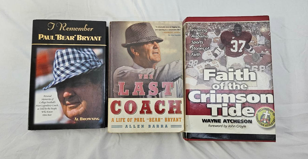 Three Alabama football books about Bear Bryant and the Crimson Tide shown front-facing.
