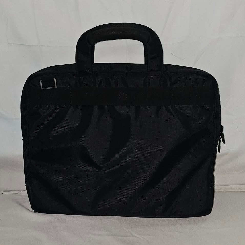 Rear exterior of the black Targus SafePORT laptop briefcase with padded top handles.